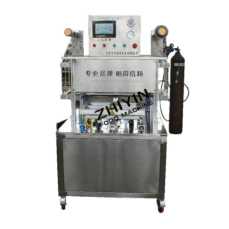 Automatic film sealing box packing machine